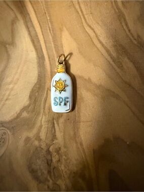 Gold & White SPF Bottle Charm